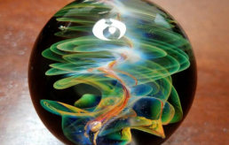 Glass marble with space stlying