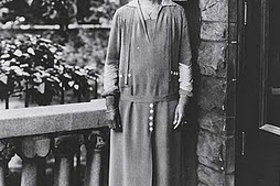 Annie Malone standing in front of a doorway