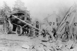 The workers at entrepreneur Daniel Kuhn’s lumber mill harnessed steam power in 1907. Steam power allowed mills to operate anywhere, not just near water, and this operation was located next to the J. Huston Tavern in the heart of Arrow Rock.