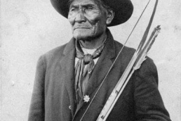 Portrait of Geronimo with a bow and arrows