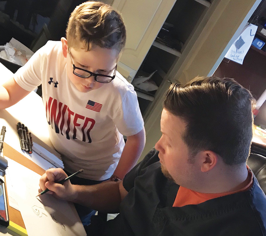 Father and Son doing homework together