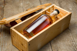 Bottle of whiskey in wooden box