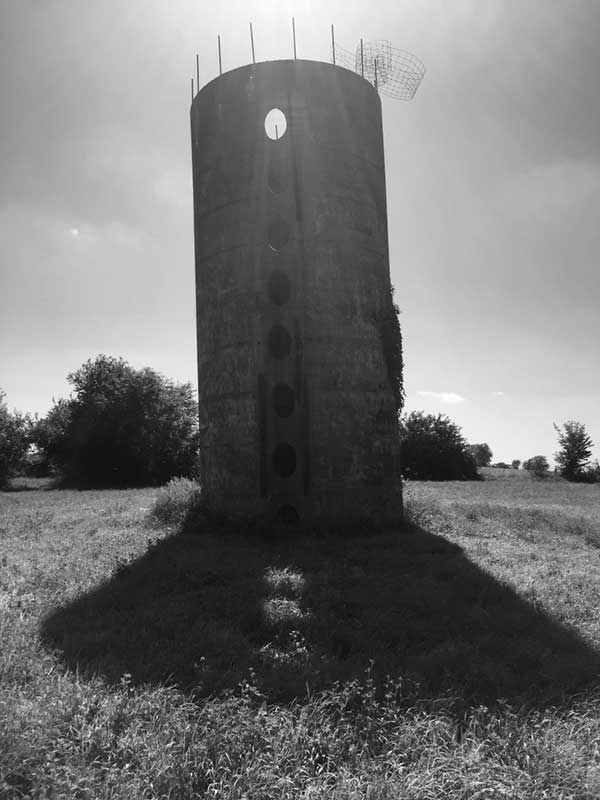 Black and white photo of the old silo owned by Gary Rhoades in rural Johnson County, Missouri