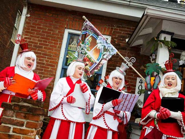 Christmas Carolers performing on Main Street in St. Charles for it's annual Christmas Traditions Shopping Season
