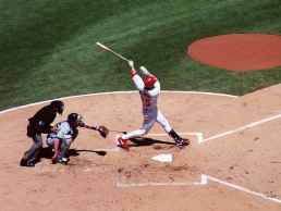 St. Louis Cardinals baseball player hitting a home run in Busch Stadium