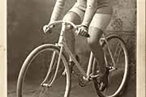 A Starke card showing a woman from St. Louis riding a trail cruiser bike