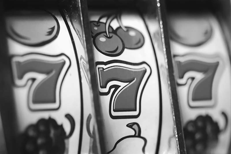 Vintage, black and white slot machine.