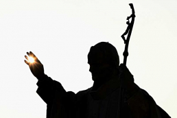 Silhouette image of the pope, illustrating Pope John Paul II visiting St. Louis in January 1999. Adobe Stock photo.